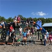 Children and counselors on a playground